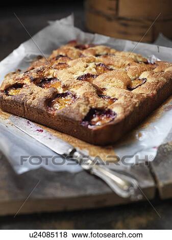 Tray of baked fruit tart View Large Photo Image Stock Photo - Tray of baked fruit tart. Fotosearch