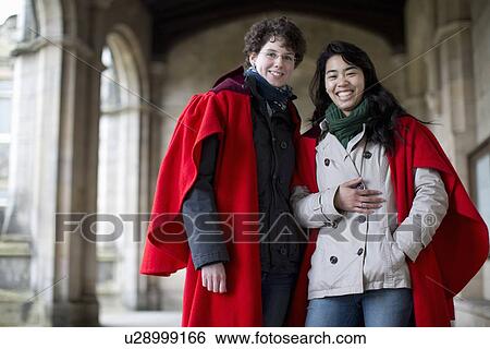 Stock Photograph - University students in traditional capes. Fotosearch