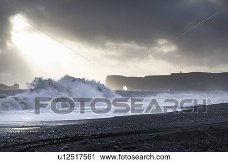 Waves crashing on sandy beach View Large Photo Image Stock Image - Waves crashing on sandy beach. Fotosearch