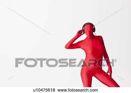 Woman in bodysuit wearing headphones View Large Photo Image Stock Photo - Woman in bodysuit wearing headphones. Fotosearch