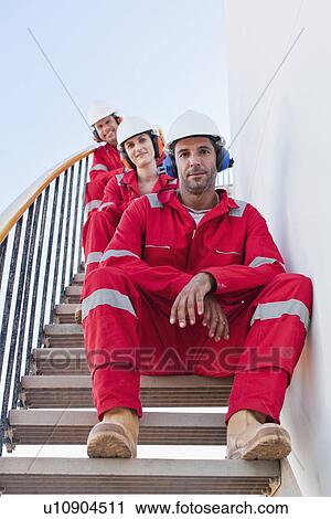 Workers on steps at chemical plant View Large Photo Image Stock Image - Workers on steps at chemical plant. Fotosearch