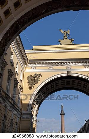 Stock Photo - Alexander Column viewed through the Triumphal Arch of General Staff Building, Winter Palace, State Hermitage Museum, Palace Square, St. Petersburg, Russia. Fotosearch