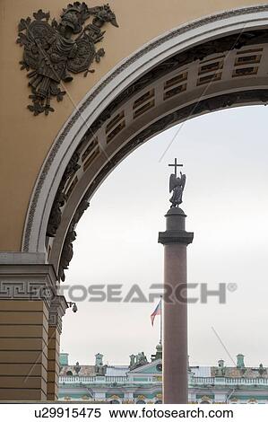 Stock Photography - Alexander Column viewed through the Triumphal Arch of General Staff Building, Winter Palace, State Hermitage Museum, Palace Square, St. Petersburg, Russia. Fotosearch