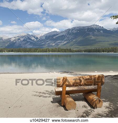 Bench made from wooden log at the lakeside, Edith Lake, Jasper, Jasper National Park, Alberta, Canada View Large Photo Image Stock Photo - Bench made from wooden log at the lakeside, Edith Lake, Jasper, Jasper National Park, Alberta, Canada. Fotosearch