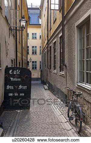 Bicycle leaning against a wall of a building, Gamla Stan, Stockholm, Sweden View Large Photo Image Stock Photo - Bicycle leaning against a wall of a building, Gamla Stan, Stockholm, Sweden. Fotosearch