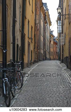 Stock Image - Bicycles leaning against a wall of a building, Gamla Stan, Stockholm, Sweden. Fotosearch