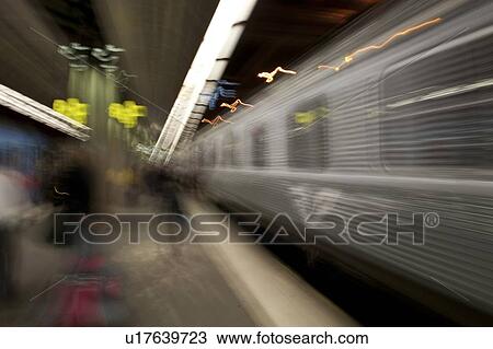 Stock Image - Blurred view of a train at a subway station, Stockholm, Sweden. Fotosearch