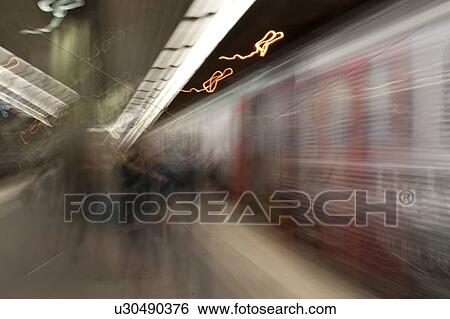 Blurred view of a train at a subway station, Stockholm, Sweden View Large Photo Image Stock Photograph - Blurred view of a train at a subway station, Stockholm, Sweden. Fotosearch