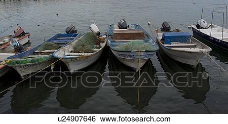 Stock Photograph - Boats at a harbor, Sayulita, Nayarit, Mexico. Fotosearch