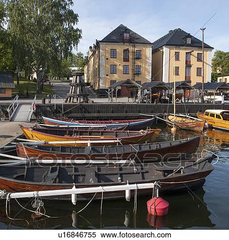 Boats moored at a harbor, Skeppsholmen Island, Stockholm, Sweden View Large Photo Image Stock Photography - Boats moored at a harbor, Skeppsholmen Island, Stockholm, Sweden. Fotosearch