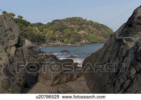 Boulders on a beach, Sayulita, Nayarit, Mexico View Large Photo Image Stock Photo - Boulders on a beach, Sayulita, Nayarit, Mexico. Fotosearch
