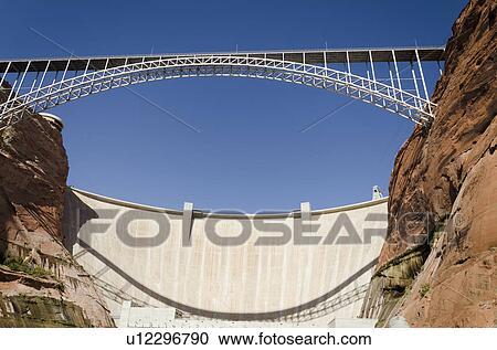 Stock Image - Bridge and Glen Canyon Dam, Colorado River, Glen Canyon National Recreation Area, Arizona, USA. Fotosearch