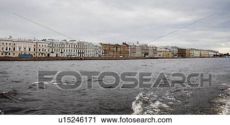 Stock Image - Buildings at the riverfront, Neva River, St. Petersburg, Russia. Fotosearch