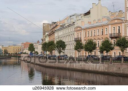 Stock Photo - Buildings at the waterfront, Moyka River, St. Petersburg, Russia. Fotosearch