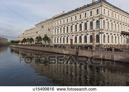 Stock Photograph - Buildings at the waterfront, Moyka River, St. Petersburg, Russia. Fotosearch