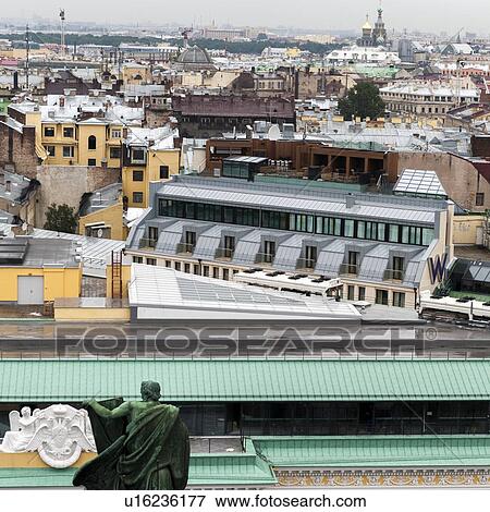 Stock Photo - Buildings in a city, Saint Isaac's Cathedral, St. Petersburg, Russia. Fotosearch