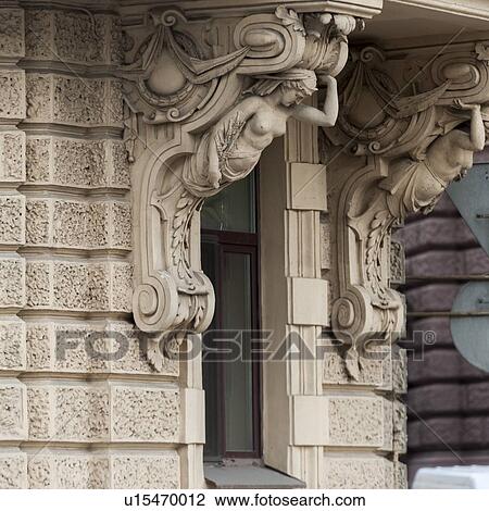 Stock Image - Carving details on the wall of a building, St. Petersburg, Russia. Fotosearch