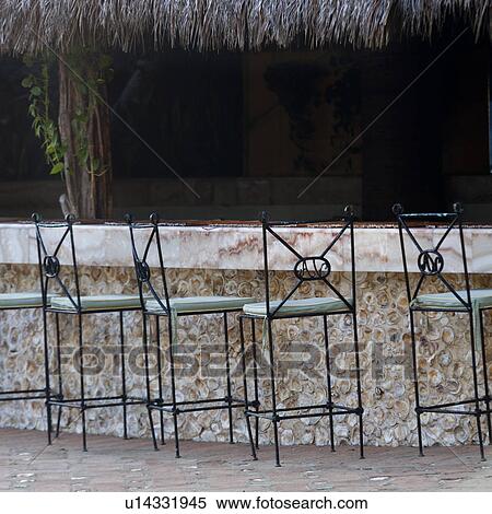 Stock Photography - Chairs in a restaurant, Sayulita, Nayarit, Mexico. Fotosearch