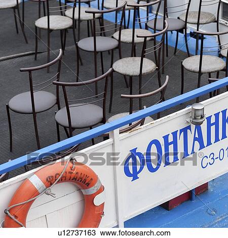 Chairs on the deck of a boat, St. Petersburg, Russia View Large Photo Image Stock Image - Chairs on the deck of a boat, St. Petersburg, Russia. Fotosearch