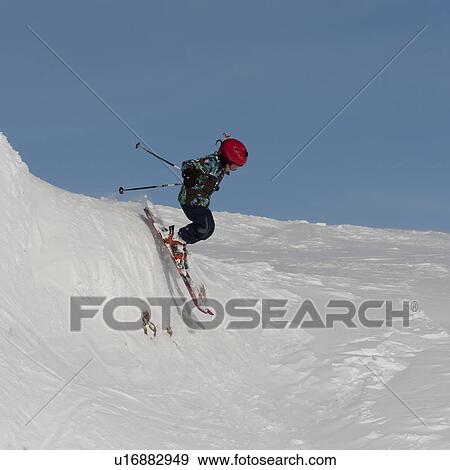 Stock Photo - Child enjoying skiing, Whistler, British Columbia, Canada. Fotosearch