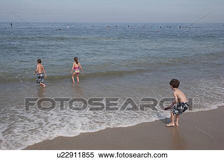 Children walking on the beach, Sayulita, Nayarit, Mexico View Large Photo Image Stock Photography - Children walking on the beach, Sayulita, Nayarit, Mexico. Fotosearch