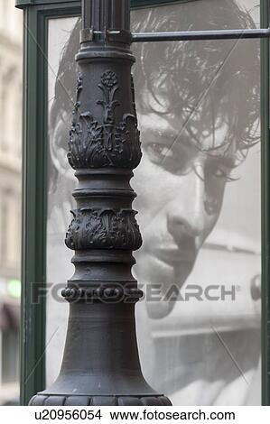 Close-up of a carved column in front of a poster, St. Petersburg, Russia View Large Photo Image Picture - Close-up of a carved column in front of a poster, St. Petersburg, Russia. Fotosearch