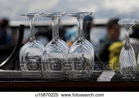Stock Photography - Close-up of empty wine glasses at bar counter, Whistler, British Columbia, Canada. Fotosearch
