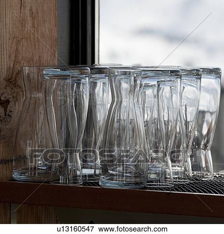 Close-up of glasses on a shelf, Whistler, British Columbia, Canada View Large Photo Image Stock Photo - Close-up of glasses on a shelf, Whistler, British Columbia, Canada. Fotosearch