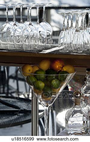 Stock Photo - Close-up of wine glasses at bar counter, Whistler, British Columbia, Canada. Fotosearch