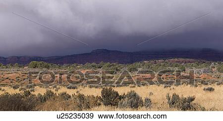 Stock Photo - Clouds over a desert, Paria Canyon, Paria, Kane County, Utah, USA. Fotosearch