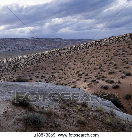 Stock Photo - Clouds over a desert, Utah, USA. Fotosearch