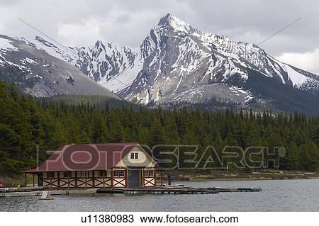 Stock Image - Curly Phillips Boathouse in Maligne Lake, Jasper National Park, Alberta, Canada. Fotosearch