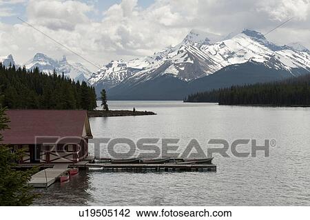 Curly Phillips Boathouse in Maligne Lake, Jasper National Park, Alberta, Canada View Large Photo Image Stock Image - Curly Phillips Boathouse in Maligne Lake, Jasper National Park, Alberta, Canada. Fotosearch