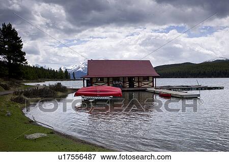 Curly Phillips Boathouse in Maligne Lake, Jasper National Park, Alberta, Canada View Large Photo Image Stock Photo - Curly Phillips Boathouse in Maligne Lake, Jasper National Park, Alberta, Canada. Fotosearch