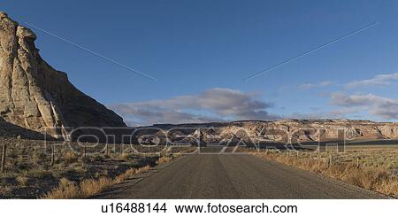 Dirt road passing through a landscape, Amangiri, Canyon Point, Hoodoo Trail, Utah, USA View Large Photo Image Picture - Dirt road passing through a landscape, Amangiri, Canyon Point, Hoodoo Trail, Utah, USA. Fotosearch