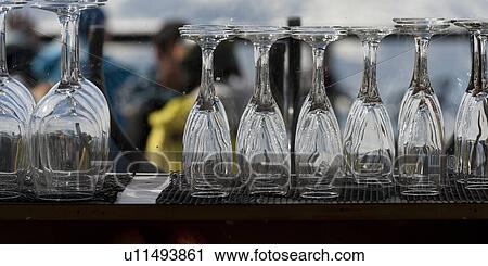 Empty wine glasses and champagne flutes at bar counter, Whistler, British Columbia, Canada View Large Photo Image Stock Image - Empty wine glasses and champagne flutes at bar counter, Whistler, British Columbia, Canada. Fotosearch