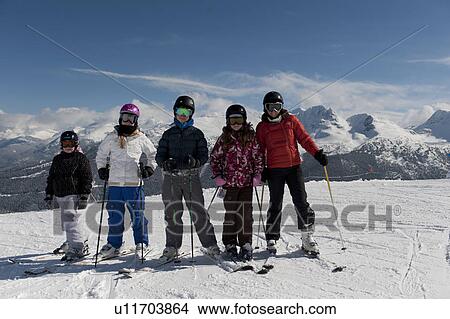 Family at a ski resort, Whistler, British Columbia, Canada View Large Photo Image Picture - Family at a ski resort, Whistler, British Columbia, Canada. Fotosearch