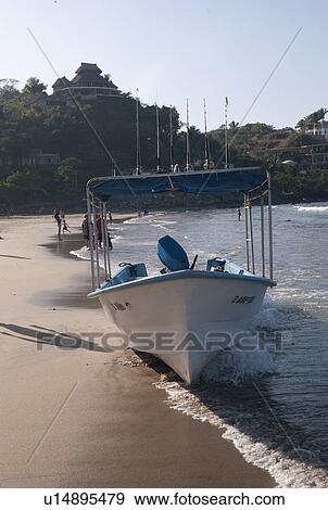 Fishing boat on the beach, Sayulita, Nayarit, Mexico View Large Photo Image Stock Photo - Fishing boat on the beach, Sayulita, Nayarit, Mexico. Fotosearch