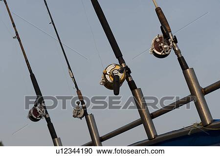 Stock Image - Fishing rods on a boat, Sayulita, Nayarit, Mexico. Fotosearch