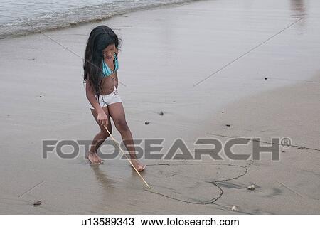 Girl drawing heart shape on the beach, Sayulita, Nayarit, Mexico View Large Photo Image Stock Image - Girl drawing heart shape on the beach, Sayulita, Nayarit, Mexico. Fotosearch