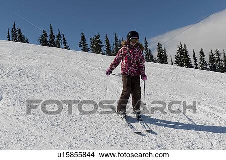 Picture - Girl skiing, Whistler, British Columbia, Canada. Fotosearch