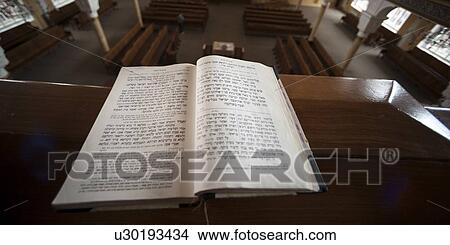 Holy book on a desk in the Grand Choral Synagogue, St. Petersburg, Russia View Large Photo Image Picture - Holy book on a desk in the Grand Choral Synagogue, St. Petersburg, Russia. Fotosearch