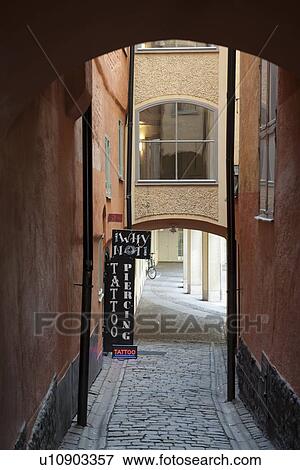 Stock Photo - Houses both sides of a street, Gamla Stan, Stockholm, Sweden. Fotosearch