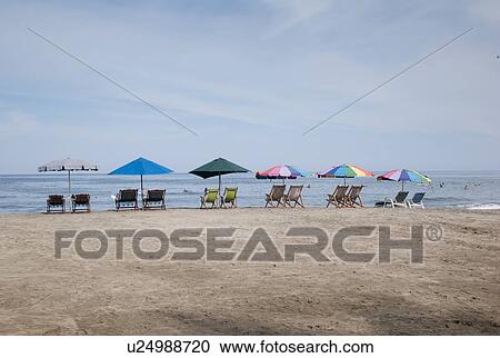 Lounge Chairs and beach umbrellas on the beach, Sayulita, Nayarit, Mexico View Large Photo Image Stock Image - Lounge Chairs and beach umbrellas on the beach, Sayulita, Nayarit, Mexico. Fotosearch