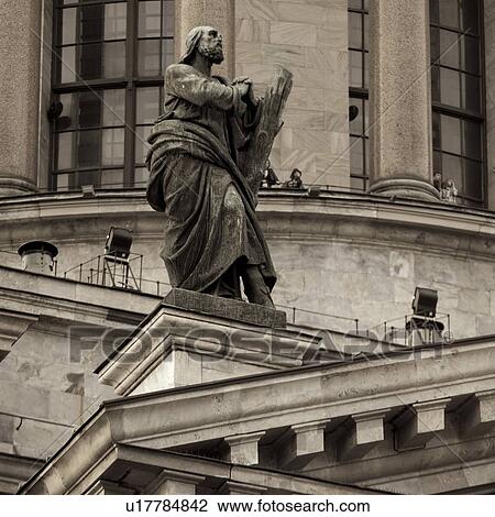 Stock Image - Low angle view of a statue at Saint Isaac's Cathedral, St. Petersburg, Russia. Fotosearch