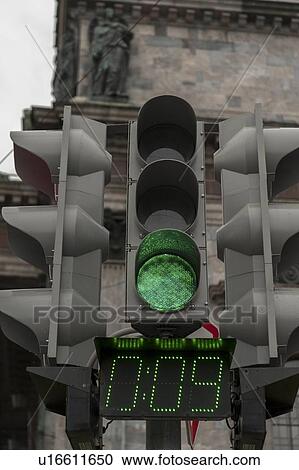 Stock Image - Low angle view of green traffic light, St. Isaac's Square, St. Petersburg, Russia. Fotosearch