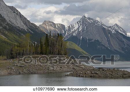 Medicine Lake with mountain in background, Jasper National Park, Alberta, Canada View Large Photo Image Stock Image - Medicine Lake with mountain in background, Jasper National Park, Alberta, Canada. Fotosearch