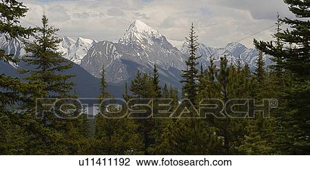Stock Image - Mountain range, Samson Peak, Maligne Lake, Jasper National Park, Alberta, Canada. Fotosearch