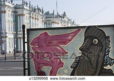Painting on a street with buildings in the background, Winter Palace, State Hermitage Museum, Palace Square, St. Petersburg, Russia View Large Photo Image Stock Photograph - Painting on a street with buildings in the background, Winter Palace, State Hermitage Museum, Palace Square, St. Petersburg, Russia. Fotosearch