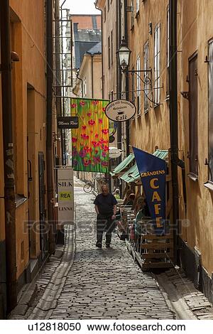 People at a cafe on a street, Gamla Stan, Stockholm, Sweden View Large Photo Image Stock Image - People at a cafe on a street, Gamla Stan, Stockholm, Sweden. Fotosearch